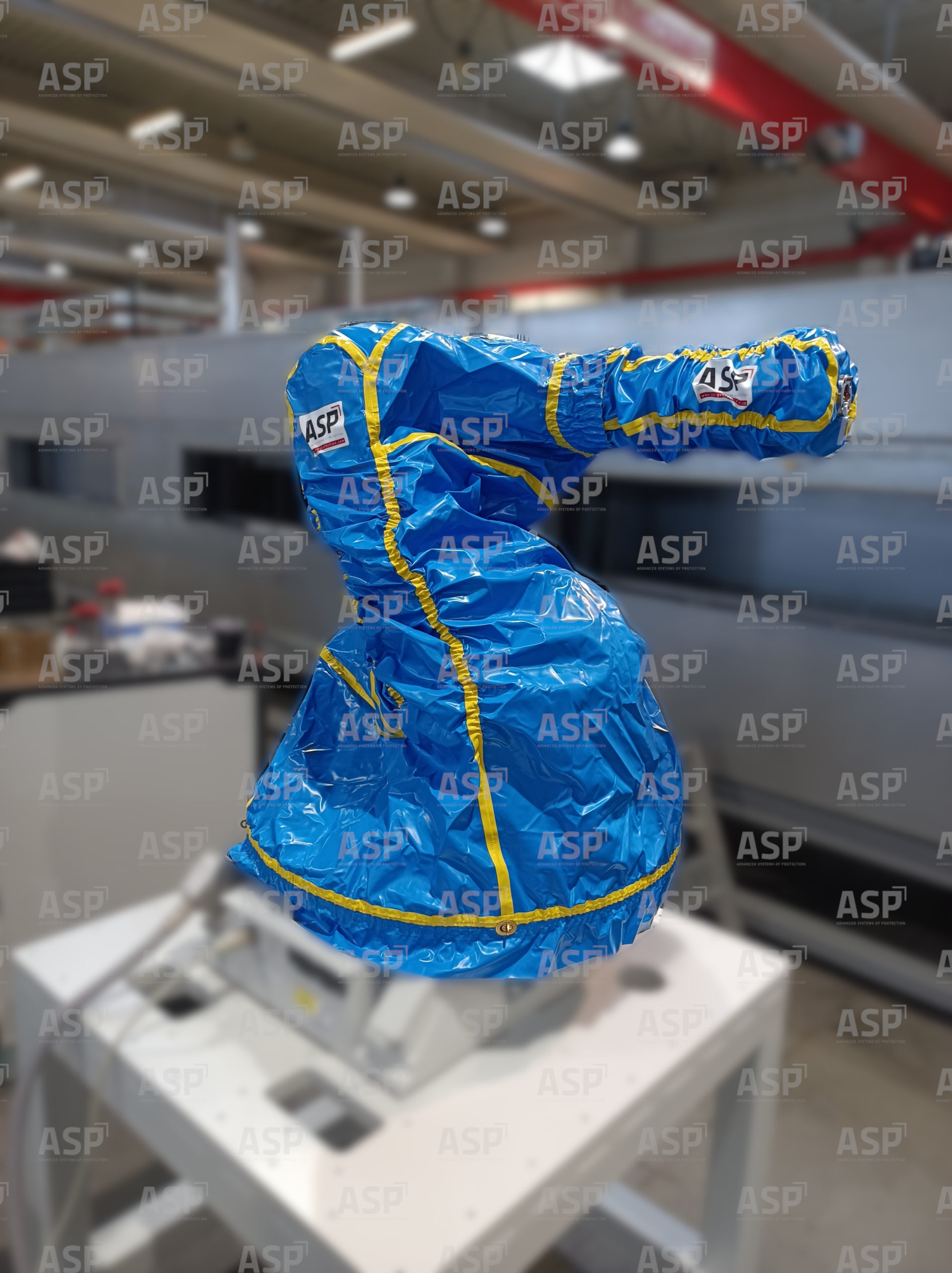 Copertura per robot di sbavatura e taglio